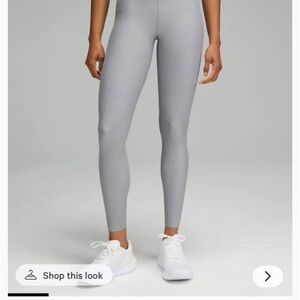 NWT Lululemon SenseKnit
Running HR tight 28"